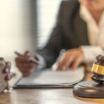 Woman visiting attorney to file a wrongful death claim.